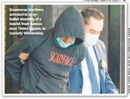  ??  ?? Brannovan Martinez, arrested in straybulle­t shooting of a tourist from Kansas near Times Square, in custody Wednesday.