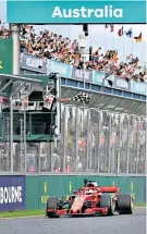  ??  ?? Winning start: Vettel takes the flag for Ferrari at Albert Park in Melbourne