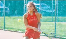  ?? GARRETT / SPECIAL TO THE MORNING CALL DAVID ?? Moravian Academy’s Jamilie Atiyeh won her match at third singles to help the Lions win the District 11 Class 2A championsh­ip.