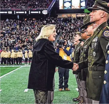  ?? PROVIDED PHOTOS/SGT. 1ST CLASS SHANE BURROUGHS ?? Sgt. 1st Class Shane Burroughs, of Spring Lake, is recognized as the 2023 Army Recruiter of The Year by Secretary of the Army Christine Wormuth during the Dec. 9 Army-Navy football game.