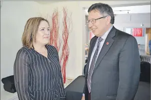  ?? CAPE BRETON POST PHOTO ?? Senator Dan Christmas speaks with Rochelle Hatcher, manager of fund developmen­t with the Cape Breton Regional Hospital Foundation, after his address to the annual general meeting of the Sydney and Area Chamber of Commerce on Monday. Christmas, former...