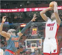  ?? DAVID SANTIAGO/TNS ?? Dion Waiters’ (11) shot selection has been questioned in past seasons but the Heat coaches are working with him to build his efficiency.