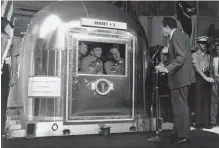  ?? NASA NYT ?? Apollo 11 astronauts Neil Armstrong, Michael Collins and Buzz Aldrin are welcomed back to Earth by U.S. president Richard Nixon.