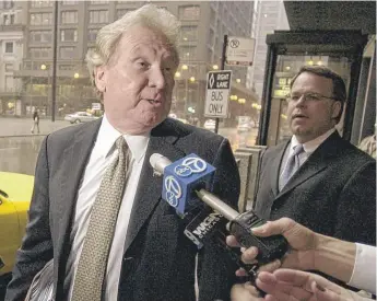  ?? | AP FILE PHOTO ?? Former insurance mogul Michael Segal ( left) is shown leaving federal court during his trial in 2004.