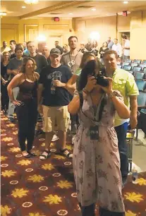  ?? COURTESY OF JAMILLE DECKER ?? Jamille Decker takes a photo as she leads a VIP event during the 2018 tour of Toad the WetSprocke­t.