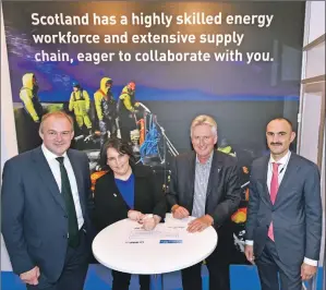  ??  ?? At the Wind Energy Expo in Hamburg last September, CS Wind and Burcote Wind signed a memorandum of understand­ing. From the leftare: Sir Edward Davey, former Secretary of State for Energy and Climate Change; Lesley Black, CS Wind; Graham Brown, Burcote...