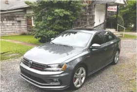  ?? PHOTOS BY MARK KENNEDY ?? The 2017 VW Jetta GLI looks mild-mannered but packs a big punch.