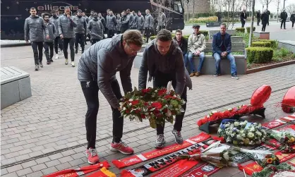  ??  ?? Jürgen Klopp and Jordan Henderson lay a wreath at the Hillsborou­gh disaster memorial outside Anfield in 2019. Photograph: Liverpool FC/Getty Images