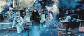  ?? UNIVERSAL PICTURES AND MRC PHOTO ?? Hester Shaw (Hera Hilmar) and citizens of a small traction town on the run as the city of London bears down on them in “Mortal Engines.”