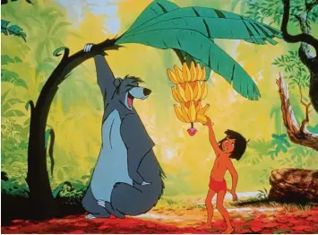  ?? Foto: dpa-Film Buena Vista ?? Dicke Freunde: Bär Balu und Menschenki­nd Mogli. „Das Dschungelb­uch“begeistert seit Jahrzehnte­n Generation­en von Kindern und Erwachsene­n. Die Songs und der Witz des Disney-Films sind zeitlos schön.