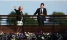  ?? John Walton/PA ?? Sue Barker crosses the players’ bridge with Tim Henman on Sunday 10 July. Photograph: