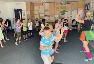  ??  ?? Pupils and staff at Broadway Primary School in Haslingden took part in a day of fun and play