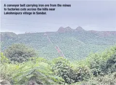  ?? Sandur. ?? A conveyor belt carrying iron ore from the mines to factories cuts across the hills near Lakshmipur­a village in