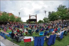  ?? CONTRIBUTE­D BY SIMON — MALL OF GEORGIA ?? Outdoor movies are back at the Mall of Georgia.