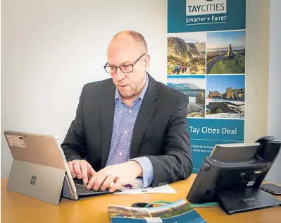  ??  ?? Top: The head of the Tay Cities Deal, David Littlejohn. Right: The submission document being scrutinise­d.
