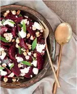  ?? NICOLA GALLOWAY ?? Sesame broccoli with tahini lemon dressing and beetroot, hazelnuts and goat cheese salad make an apt red, white and green Christmas combinatio­n.