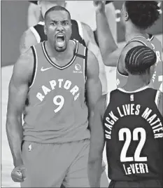  ?? KIM KLEMENT/AP ?? Raptors center Serge Ibaka yells after making a basket Friday against the Nets.