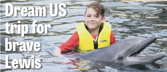  ??  ?? Lewis Cole swimming with dolphins. Below, Lewis and his teacher Amy Etheringto­n, who has raised funds for the Cystic Fibrosis team at Newcastle RVI which treats the youngster.