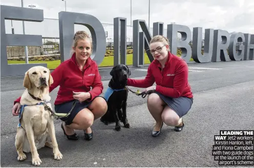  ??  ?? LEADING THE WAY Jet2 workers Kirstin Hanlon, left, and Fiona Campbell with two guide dogs at the launch of the airport’s scheme