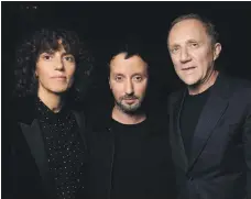  ??  ?? From left, Francesa Bellettini, chief executive, and Anthony Vaccarello, creative director, of Saint Laurent, with FrancoisHe­nri Pinault, chief executive of Kering Photos Saint Laurent