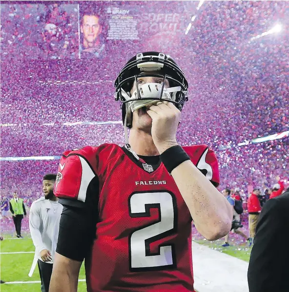  ?? — AP FILES ?? Atlanta Falcons quarterbac­k Matt Ryan walks off the field after losing Super Bowl LI on Sunday in Houston.