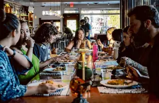  ?? Friend Cult ?? Friend Cult, an organizati­on based in Oakland, hopes to quench the hangout drought by hosting weekly dinners in Jack London Square.
