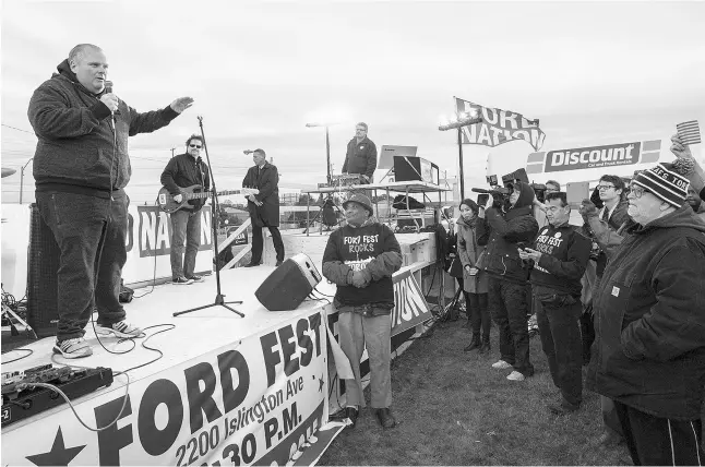  ?? PHOTOS: J.P. Moczulski for National
Post ?? Former mayor Rob Ford delivers a speech at Ford Fest in Rexdale on Friday. Those attending professed the same love for their man they always have.