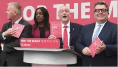  ?? — AFP ?? (L-R) Ian Lavery, Labour elections and campaign coordinato­r, Kate Osamor, Shadow minister for internatio­nal developmen­t, British opposition Labour party leader Jeremy Corbyn and deputy leader Tom Watson pose with copies of the Labour election manifesto...