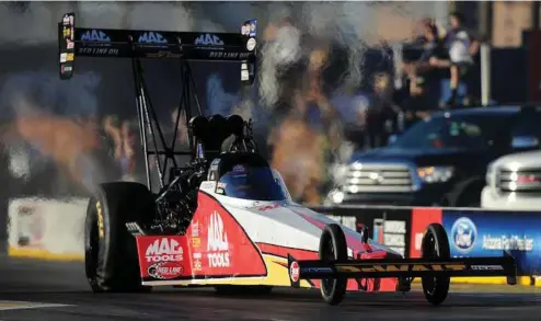  ?? Marc Gewertz / AP ?? Top Fuel’s Doug Kalitta boasts two career wins at the NHRA SpringNati­onals and is currently third in points.