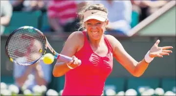  ?? By Susan Mullane, US Presswire ?? Tough day at the office: Victoria Azarenka, above, made 60 unforced errors en route to her 6-7 (6-8), 6-4, 6-2 win against Alberta Brianti on Monday. Azarenka will play Dinah Pfizenmaie­r of Germany in the second round.