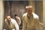  ?? Jose Haro / Associated Press ?? Roland Moller, left, and Charlie Hunnam in a scene from “Papillon.”