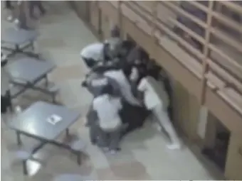  ?? COURTESY OF MASS. DEPT. OF CORRECTION ?? VICIOUS ASSAULT: Surveillan­ce video shows prison guards being assaulted at the SouzaBaran­owski Correction­al Center in Shirley on Friday.