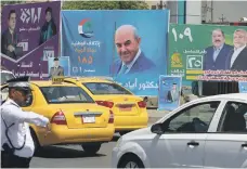  ?? AFP ?? Campaign posters for candidates in Baghdad. Women had hoped this election would bring them a greater role in government