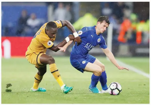  ??  ?? Leicester City’s Ben Chilwell in action with Tottenham’s Moussa Sissoko on Thursday. (Reuters)