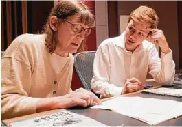  ??  ?? Professor Patricia Hall and graduate student Joshua Devries reviewing the manuscript for “The Most Beautiful Time of Life” at the Duderstadt Center recording studio in Ann Arbor.