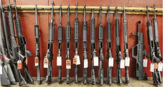  ?? Associated Press file ?? Officials at the Bureau of Alcohol, Tobacco, Firearms and Explosives were found to routinely overrule inspectors’ recommenda­tions that gun dealers lose their licenses for illegal sales.