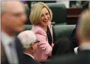  ?? The Canadian Press ?? Alberta Premier Rachel Notley shakes hands before the Speech from the Throne in Edmonton on Thursday.