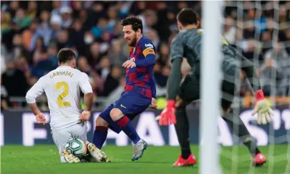  ??  ?? Real Madrid take on Barcelona on 1 March. Under existing plans the earliest return to matches will be 28 May. Photograph: DeFodi Images/Getty Images