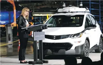  ?? ERIC SEALS, DETROIT FREE PRESS ?? GM CEO Mary Barra speaks at GM’s Orion, Michigan, assembly plant on Tuesday, announcing that the company has completed production of 130 Chevrolet Bolt EV test vehicles.