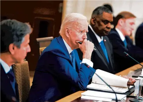  ?? BRENDAN SMIALOWSKI/GETTY-AFP ?? President Joe Biden listens Friday during a bilateral meeting with South Korean President Moon Jae-in (not shown) at White House.