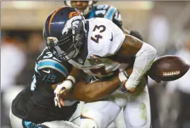  ?? Doug Benc/AP ?? Denver Broncos safety T.J. Ward (43) fumbles after being hit by Carolina Panthers fullback Mike Tolbert (35), after an intercepti­on during Super Bowl 50, Sunday, Jan. 7, 2016 in Santa Clara, Calif.