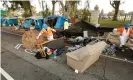  ?? Al Seib/Rex/Shuttersto­ck ?? Members of the clean-up crew dismantled tents on the Veterans Row in an effort to help homeless veterans move onto the West Los Angeles Veterans Affairs campus. Photograph: