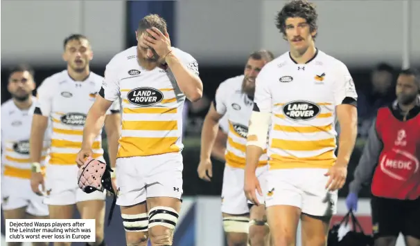  ??  ?? Dejected Wasps players after the Leinster mauling which was club’s worst ever loss in Europe