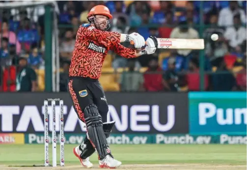  ?? Reuters ?? Sunrisers Hyderabad’s Travis Head plays a shot against Royal Challenger­s Bengaluru during their (IPL) match.