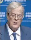  ?? Phelan M. Ebenhack AP ?? DAVID KOCH, left, and his Americans for Prosperity were bested by a citizens’ effort launched by Rick Weiland, right.