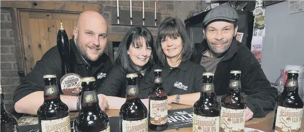  ??  ?? Wold Top Brewery is celebratin­g after its Scarboroug­h Fair IPA was named as one of the Independen­t’s “10 Best Gluten-Free Beers”. Pictured are Jason Lukehurst, Louize Jones, Vicky Skinn and Ben Costello. Picture by Richard Ponter 170715a