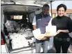  ?? PICTURE: ZANELE ZULU ?? MEALTIME: Thabo Ngcobo, manager at the Apache River Spur, and Nicky Hardwick, director of Just Us 4 Children, with the meals they have collected for the children of the Lakehaven home.