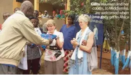  ??  ?? Gifts Maureen and her cousin, Jo Middlemiss, are welcomed when they get to Africa