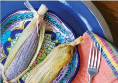  ??  ?? Little Flower Foods’ red chile pork tamales with blue corn masa.