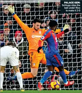  ??  ?? PALACE GEM: Schlupp slips the ball under Rico to make it 2-0